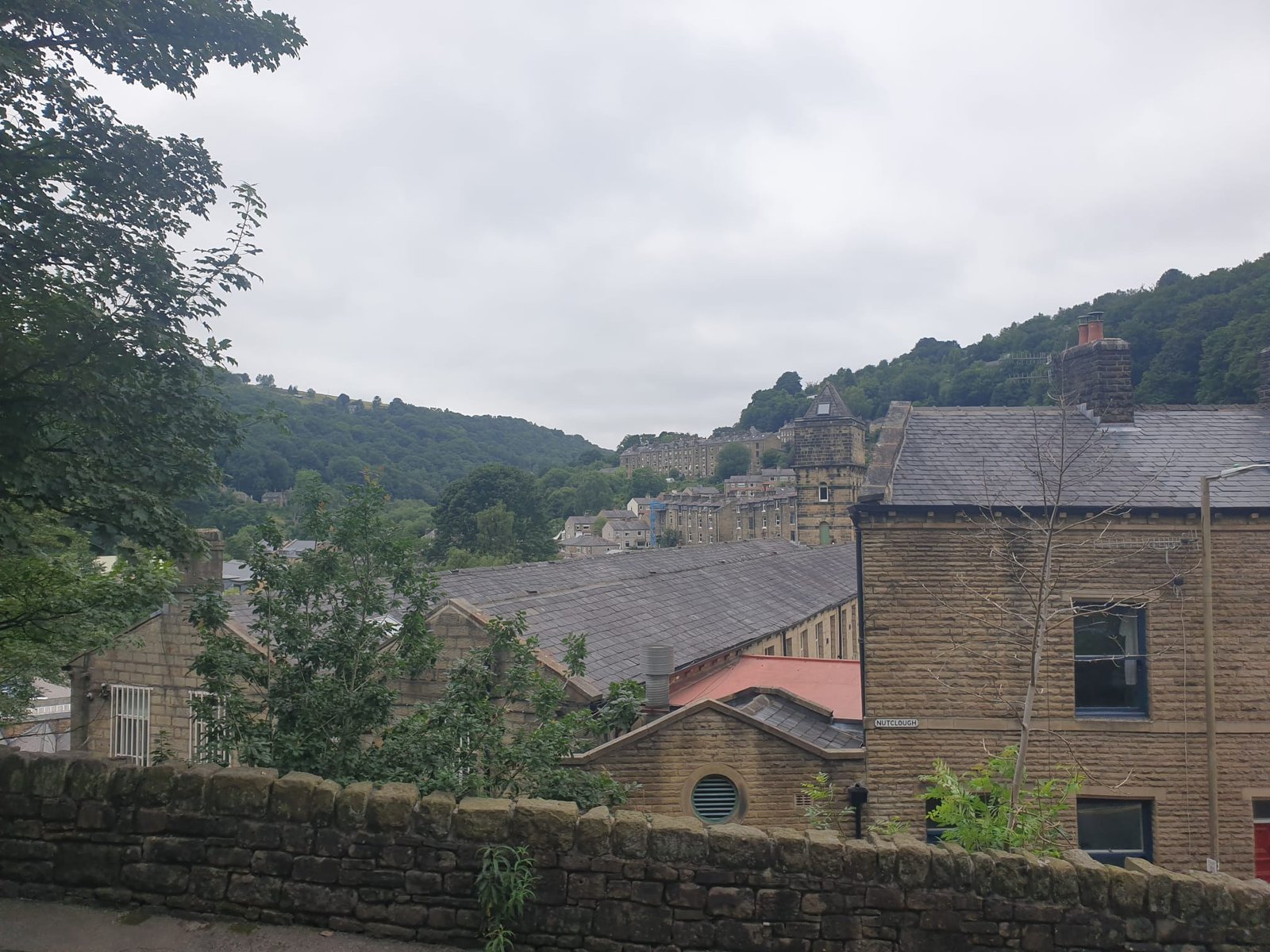 View across Hebden Bridge and the surrounding wooded hills